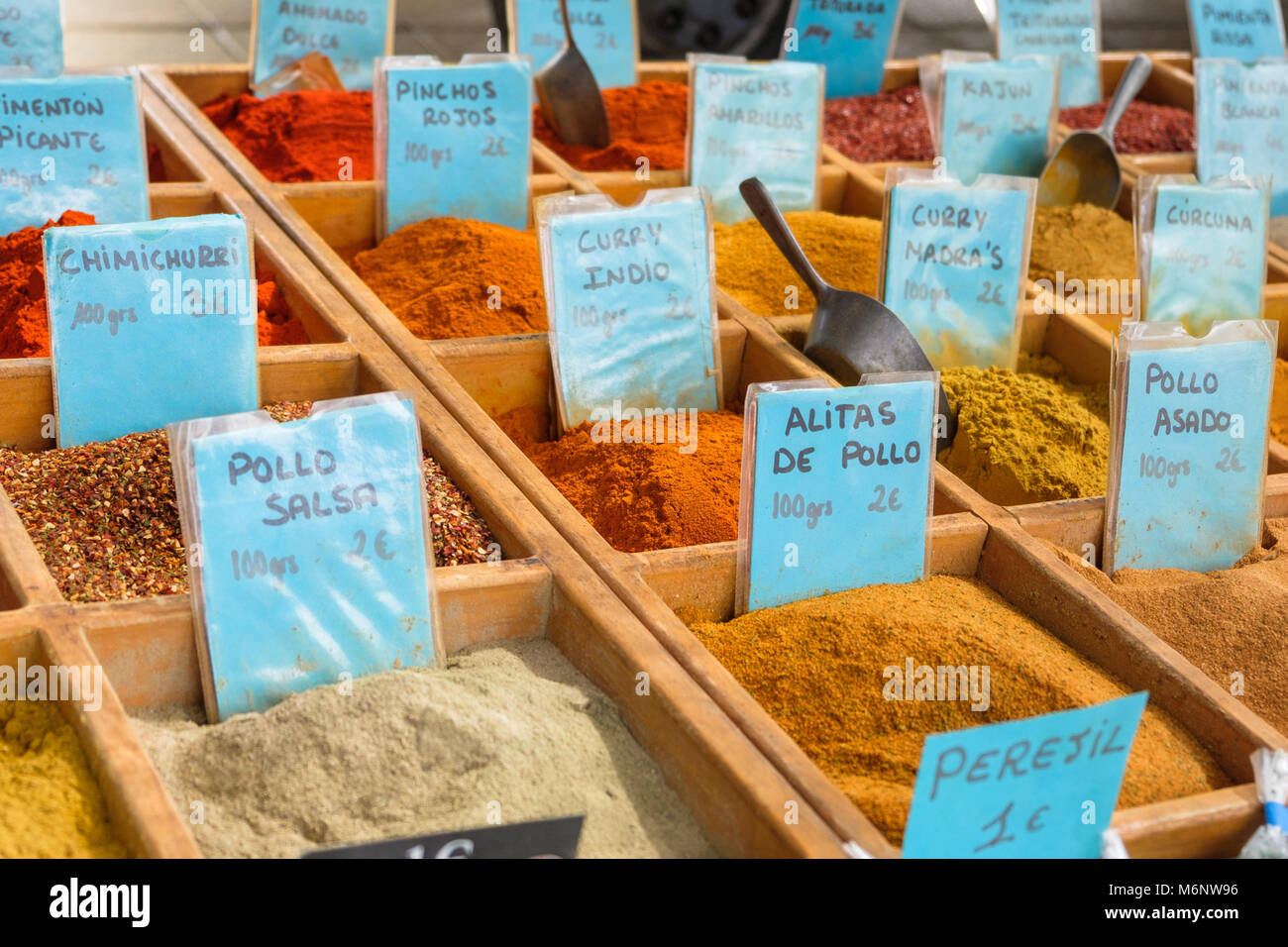 Collection of spices for sale at a market. Stock Photo