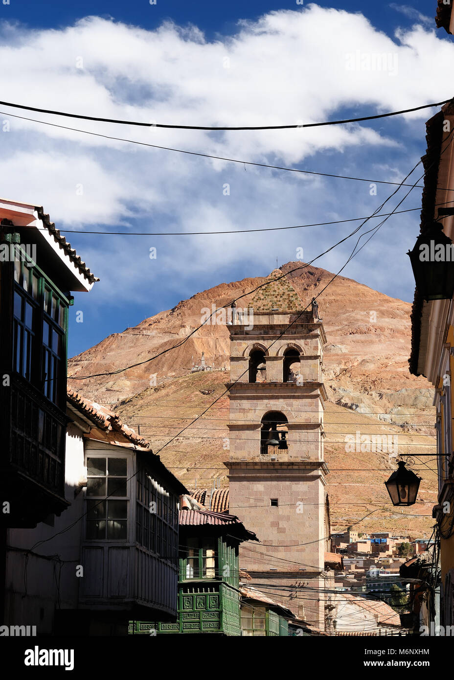 Potosi (UNESCO) in Bolivia - the world's highest city (4070m). Potosi is set against the backdrop of a ranbow-colored mountain - Cerro Rico. San Loren Stock Photo