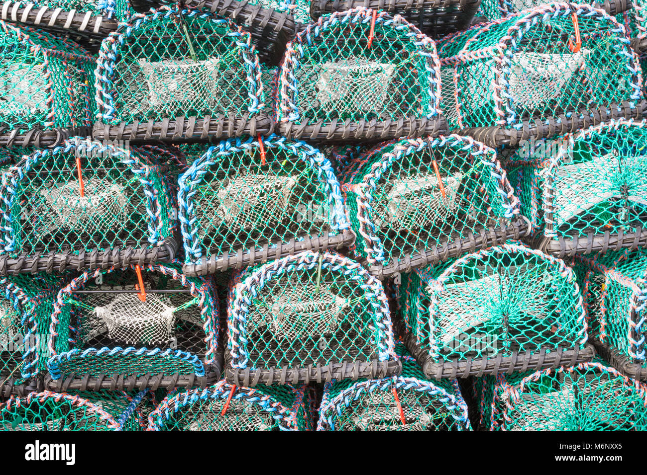 Lobster pots or cages in a stack uk Stock Photo