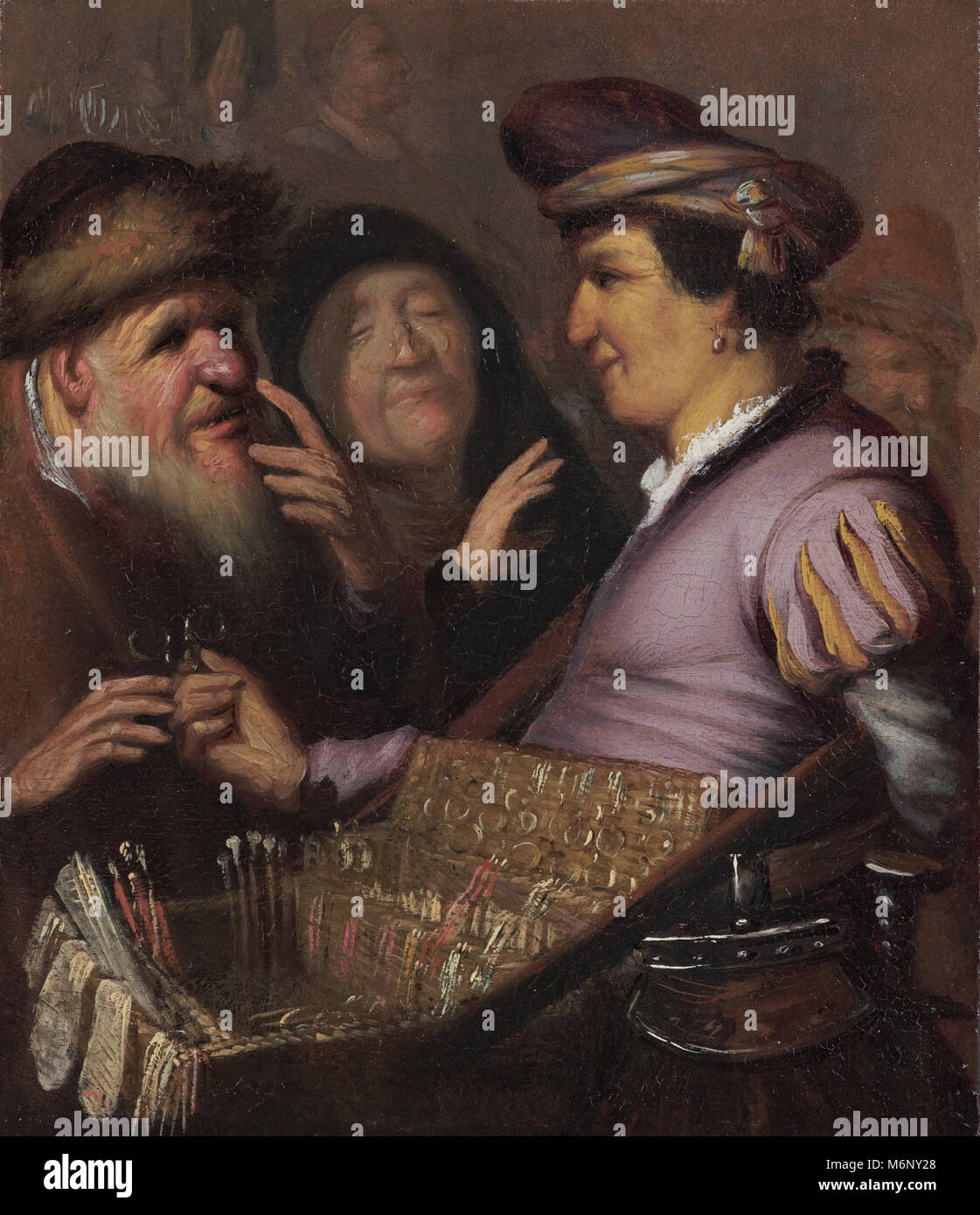 Rembrandt Harmenszoon van Rijn - The spectacle-pedlar, circa 1624–1625 Stock Photo