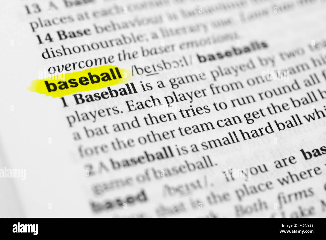 Highlighted English word 'baseball' and its definition in the dictionary. Stock Photo