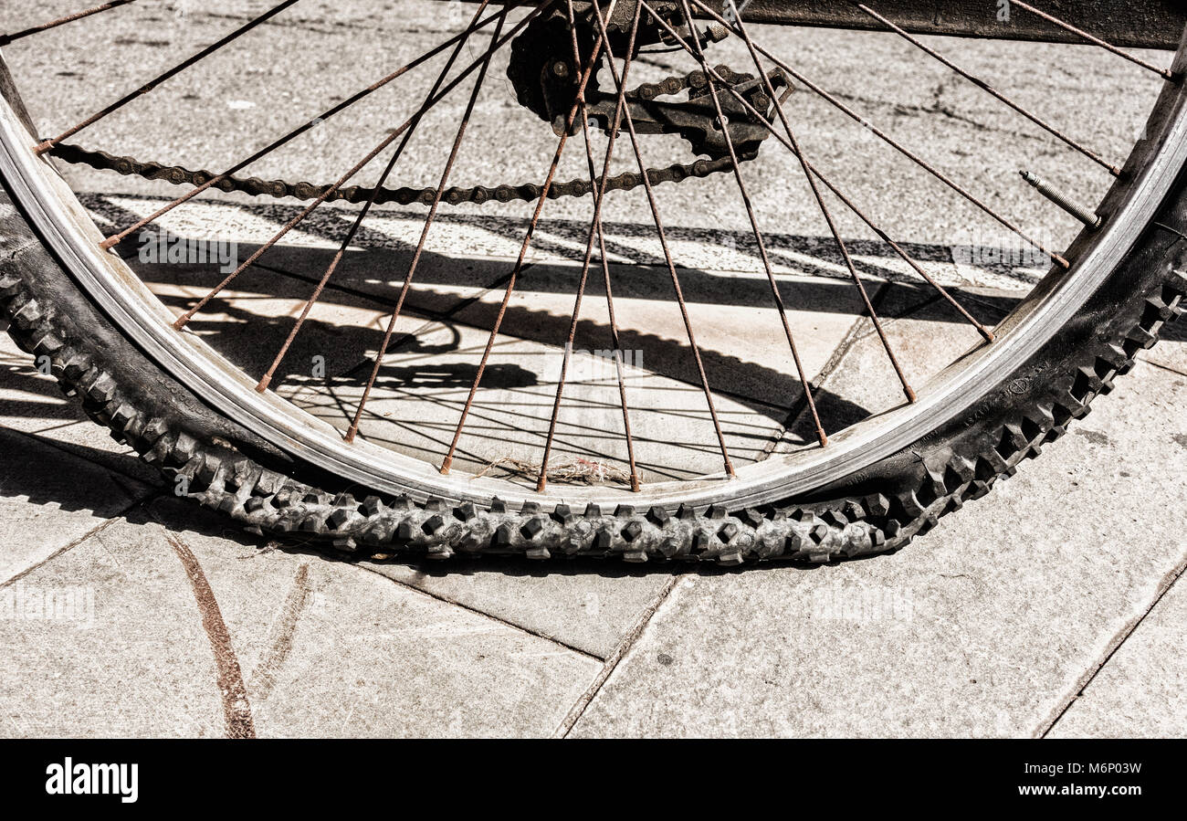 Punctured bike tyre hi-res stock photography and images - Alamy