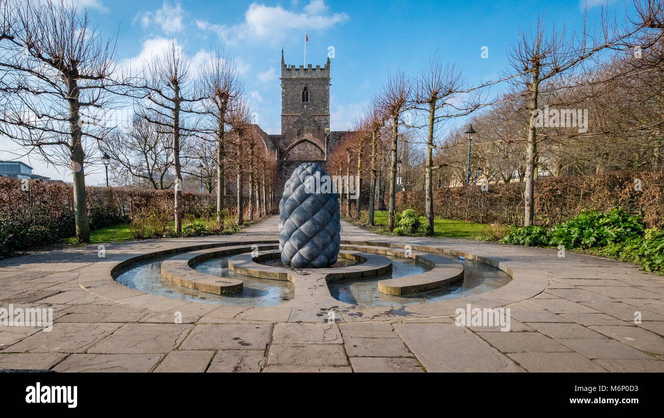 Garden water feature beside St Peter's church in Castle Park in the centre of Bristol UK with sculptures by Peter Randall-Page Stock Photo