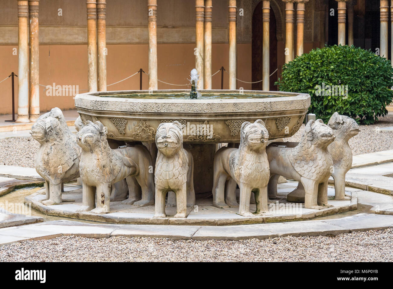 Granada, Andalusia, Spain - February 5th, 2006 : Fountain of the Court of the Lions (Patio de los Leones) in the Alhambra palace and fortress complex. Stock Photo