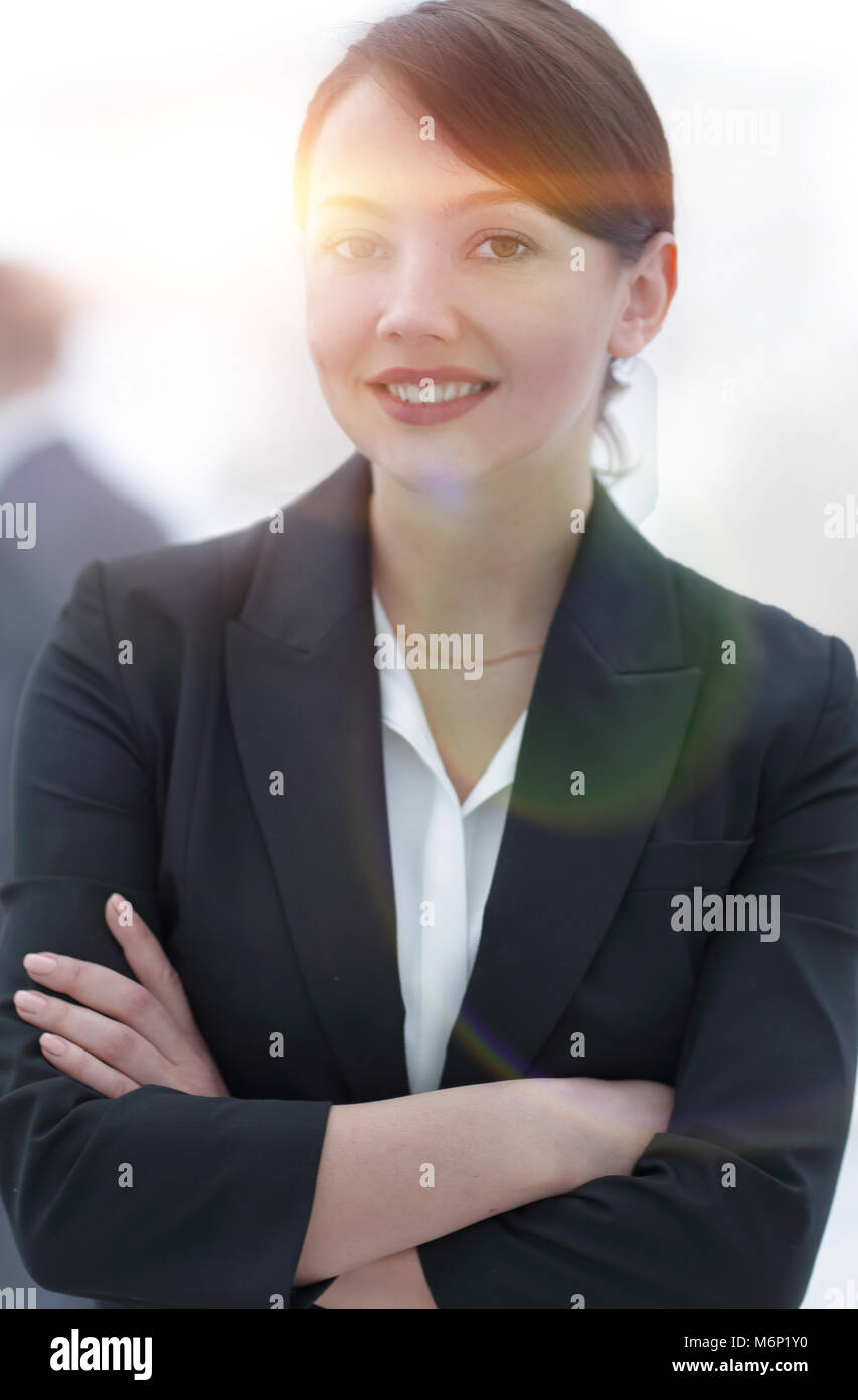 successful young business woman on the background of the office Stock ...