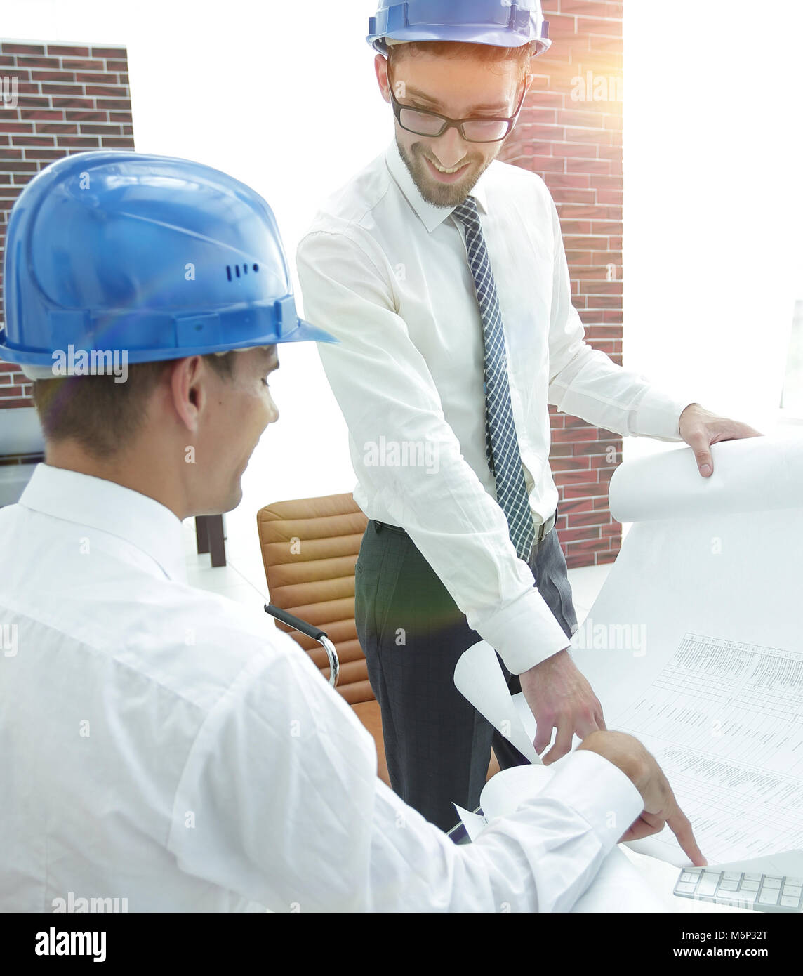 architect and engineer, considering a building project Stock Photo