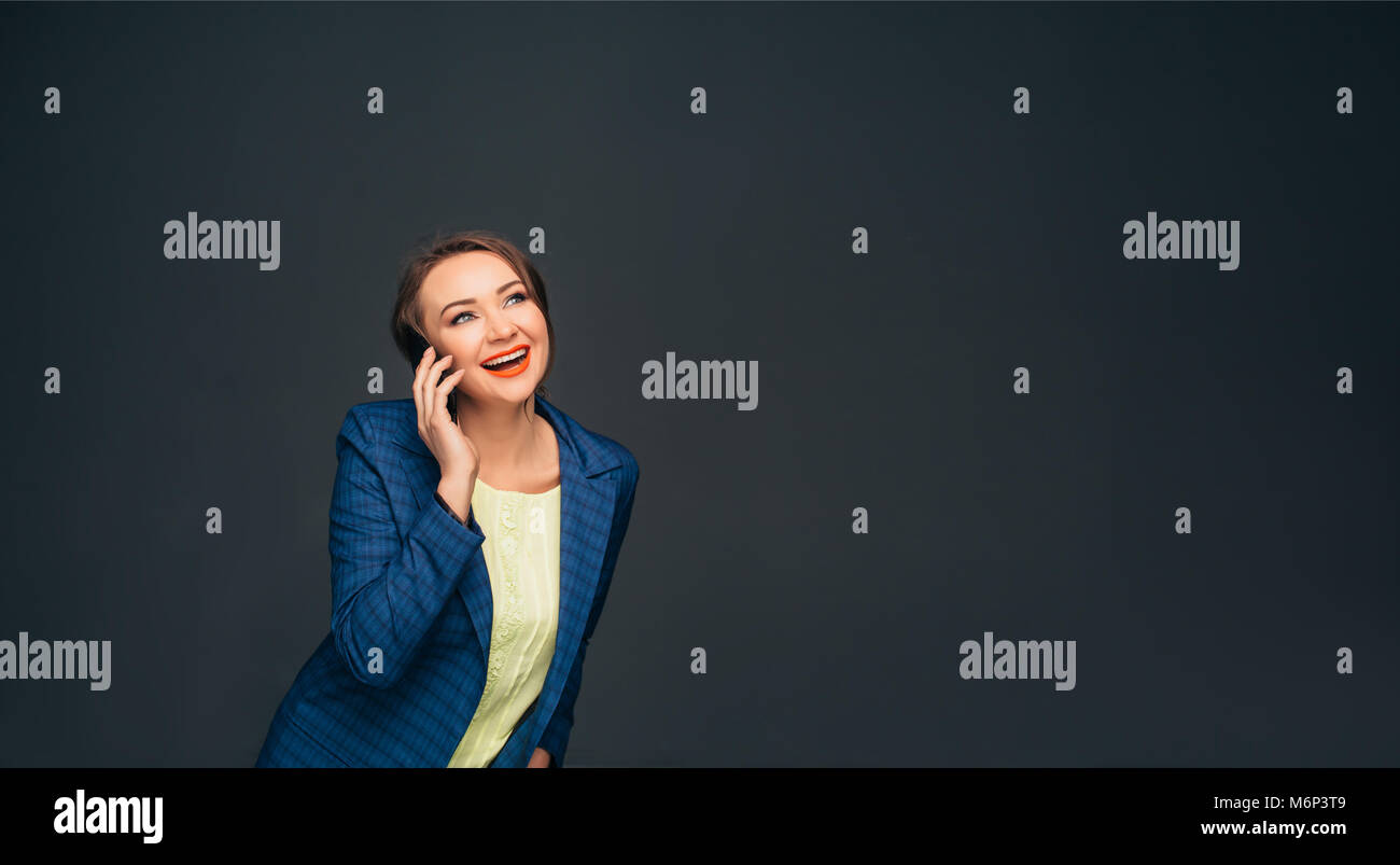 laughing business woman talking on phone Stock Photo