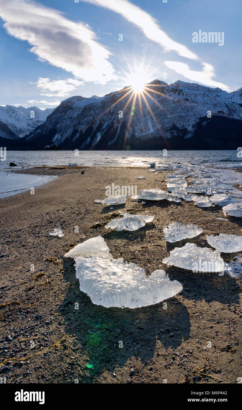 Sunburst As The Sun Sets Over The Chilkat Mountains In Southeast Alaska 