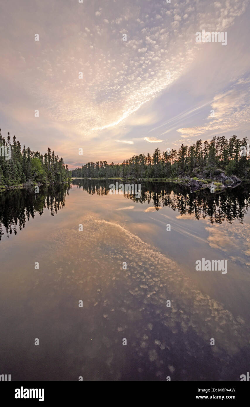 Twilight Reflections in the North Woods on Snipe Lake in the Boundary Waters in Minnesota Stock Photo