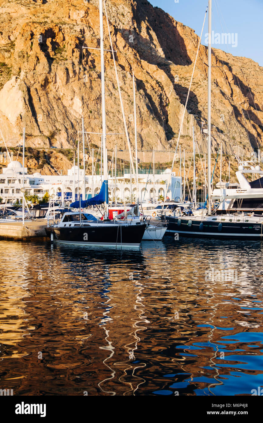 Aguadulce, Almeria province, Andalusia, Spain : Recreational boats reflected on the Mediterranean sea at the marina of Aguadulce. Stock Photo