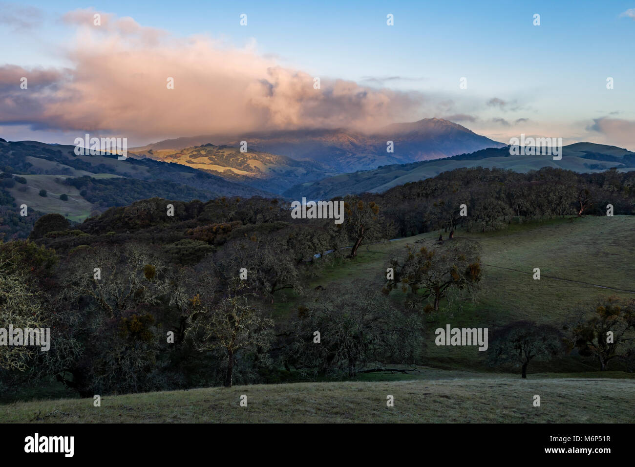 Winter storm clouds obscure the peak of Mount Diablo as they pass over the Morgan Territory Preserve in Northern California's eastern Contra Costa Cou Stock Photo