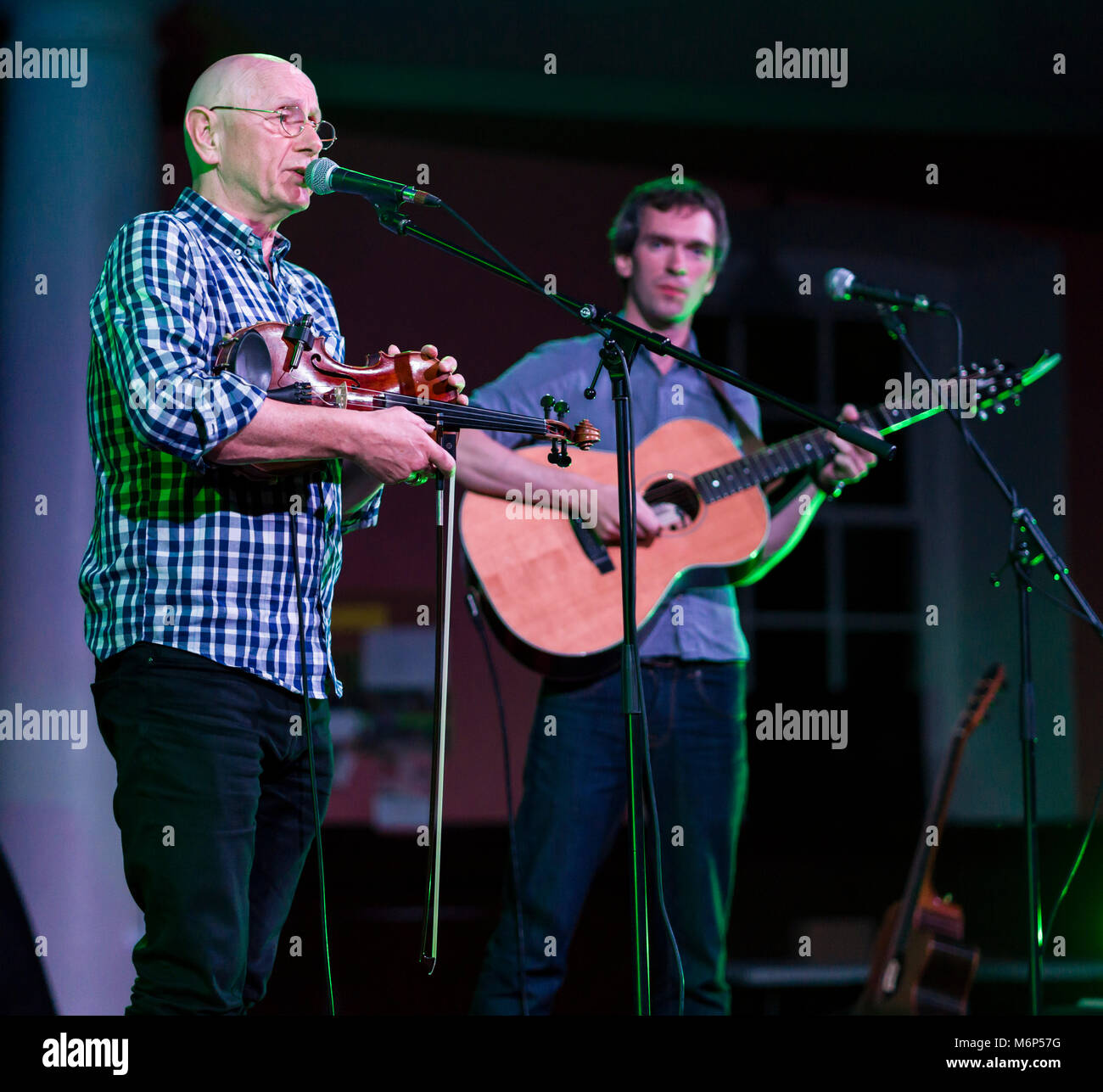 Tom McConville (fiddle) and Andy Watt (guitar) on stage, Kelso Folk Festival 2017 Stock Photo