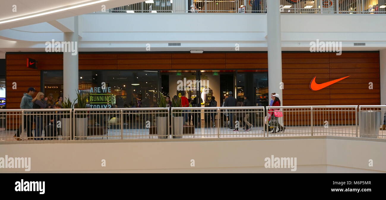 Minnesota, America - November 2016: Nike sports apparel store in large  shopping mall during holiday season. Footware sneakers and shirts Stock  Photo - Alamy