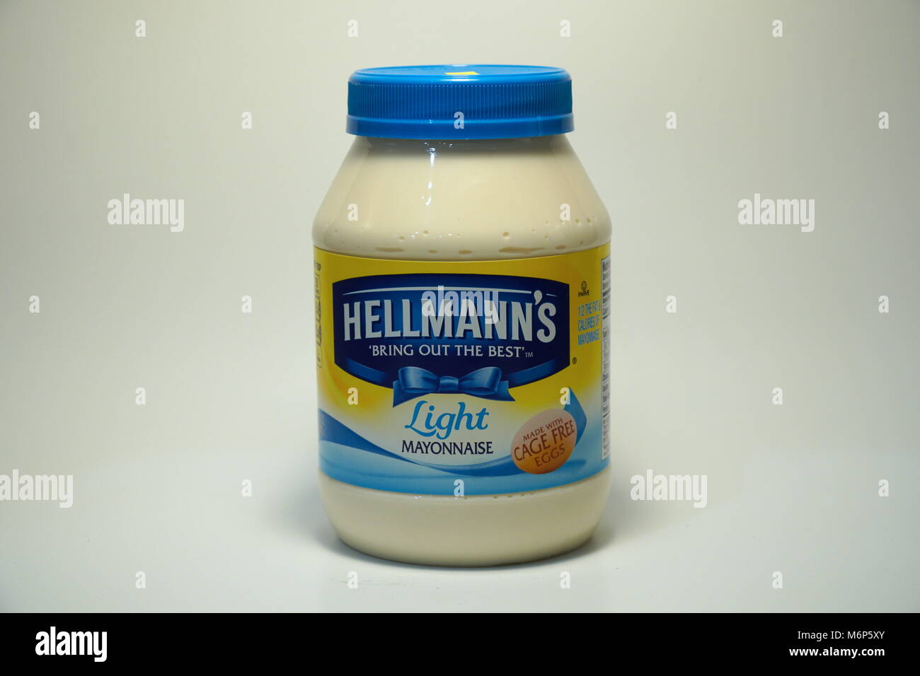 Hellmann's Mayonnaise jar product shot isolated on white background. Blue ribbon brand condiment