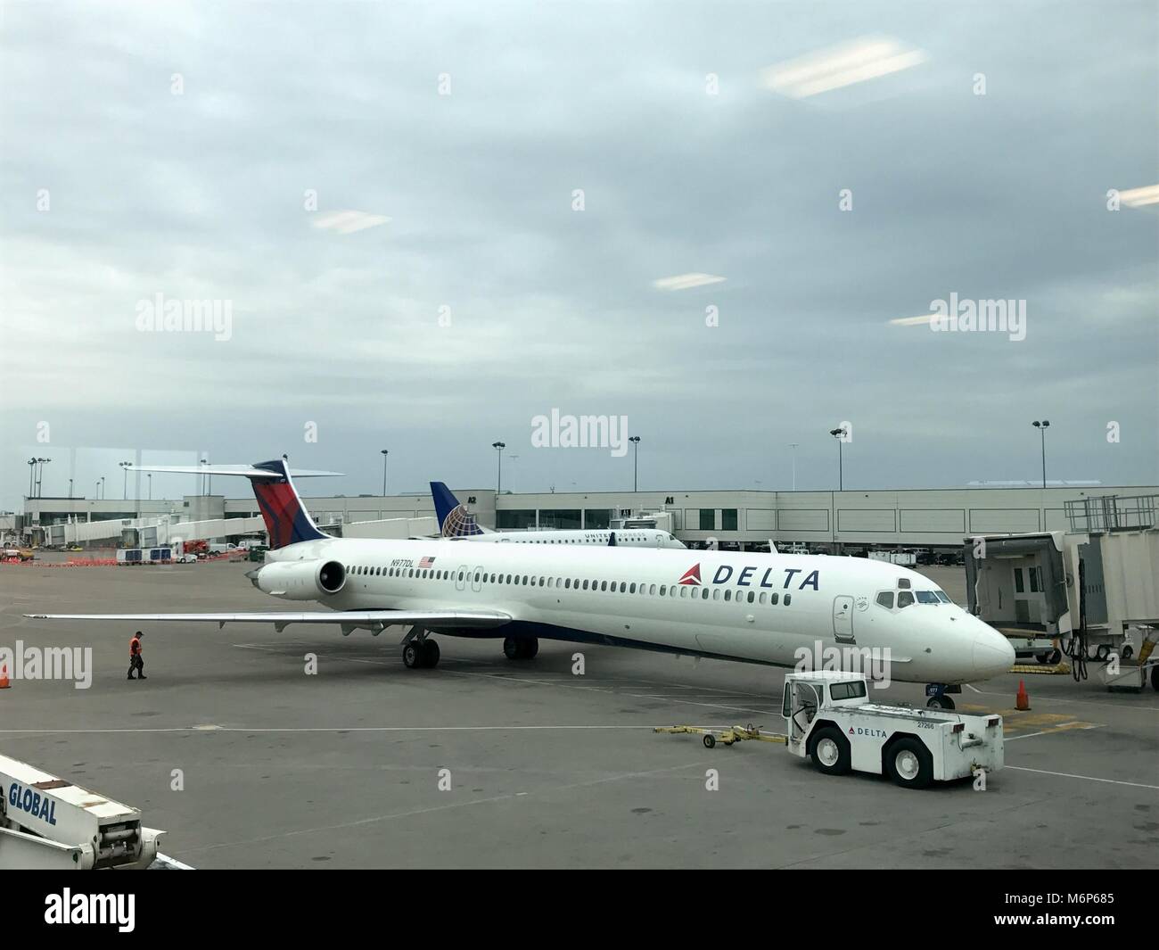 Nashville Tennessee - Circa 2017: Delta airlines McDonnell Douglas MD-90 airplane at terminal gate waiting for passengers to board and deport for flig Stock Photo