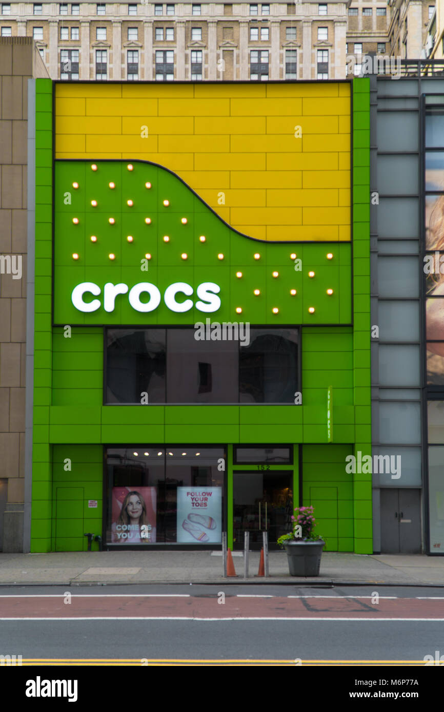 New York City, Circa 2017: Crocs footware retail store. Foam clog style  sandals open shoe design compete with sandals. Vertical frame photo Stock  Photo - Alamy