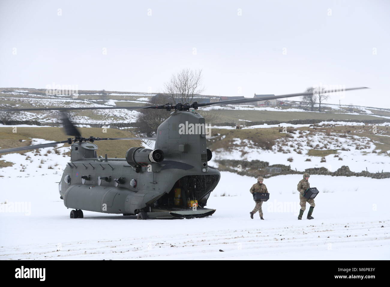 Rescue Workers Use A RAF Chinook Helicopter To Deliver Supplies To rescue-workers-use-a-raf-chinook-helicopter-to-deliver-supplies-to