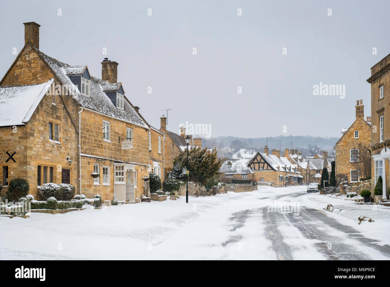 Broadway stone cottages in the winter snow. Broadway, Cotswolds