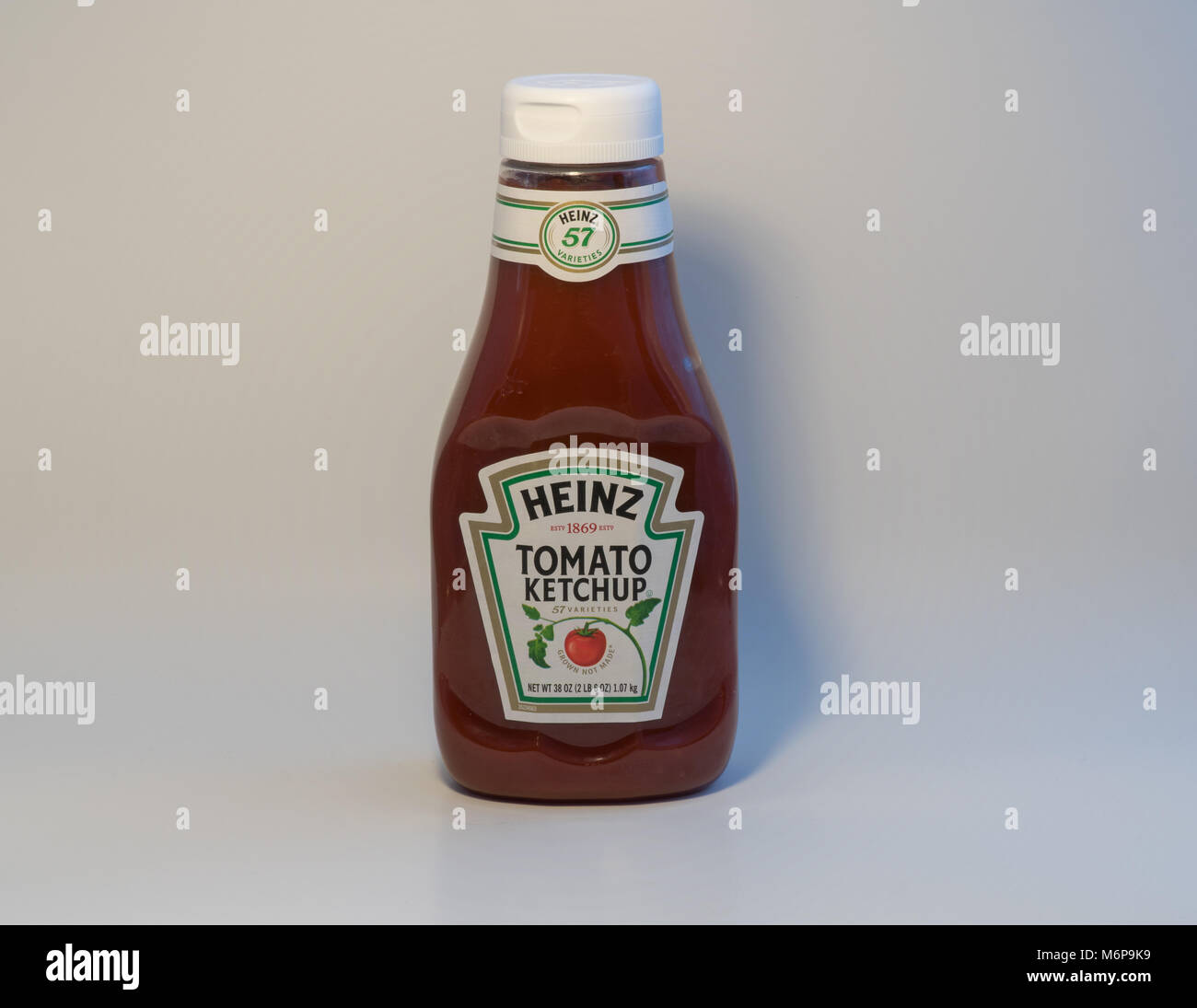 United States, Circa 2018: Heinz tomato ketchup bottle product photo against a white background. Illustrative Editorial Stock Photo