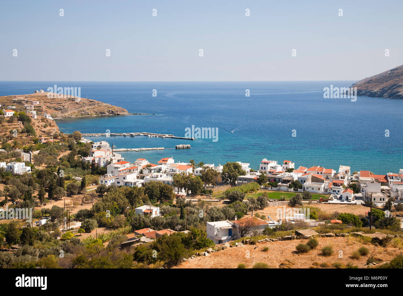 Korthi Bay and Ormos Korthiou village, Andros island, Cyclades islands, Aegean sea, Greece, Europe Stock Photo
