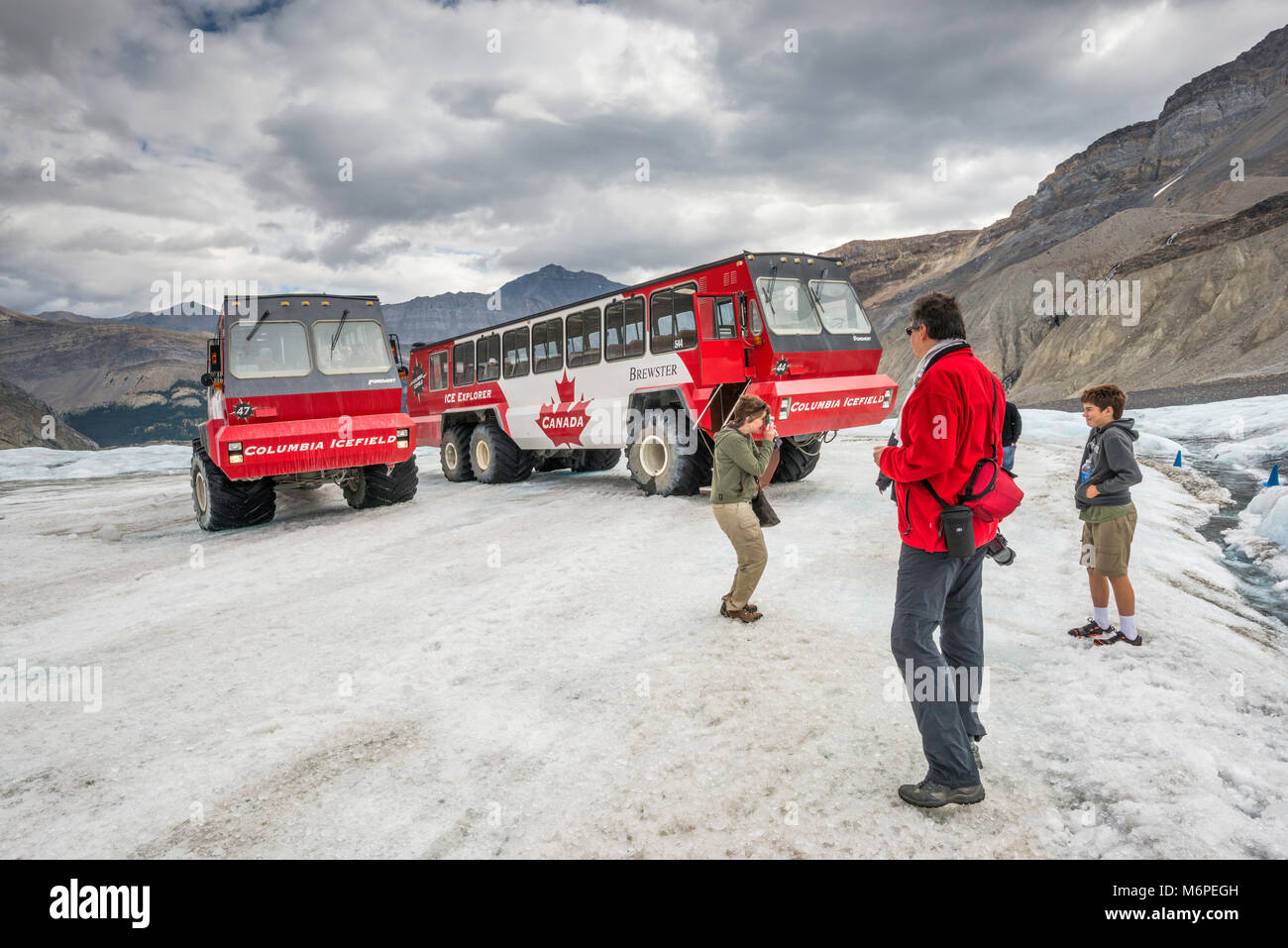 Visitors, snow coaches, at Athabasca Glacier, Jasper National Park, Alberta, Canada Stock Photo