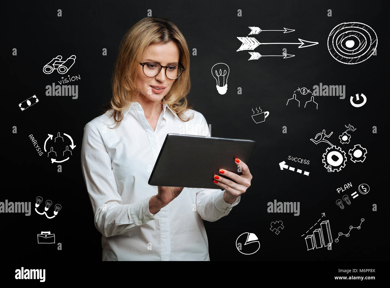 Interested Screen Experienced manager feeling interested while looking at the screen of ...
