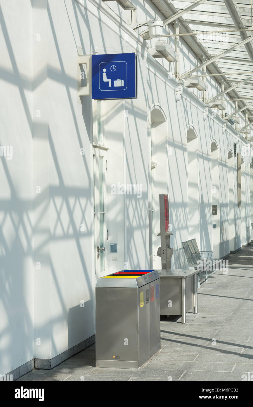 Modern train station wainting area on the platform. Stock Photo