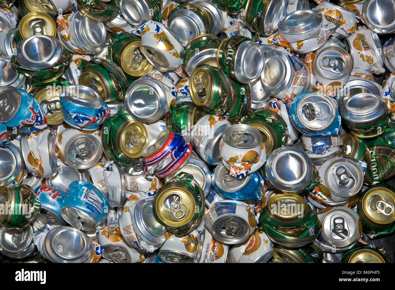 Individually crushed aluminum cans for recycling. Crushed cans take up