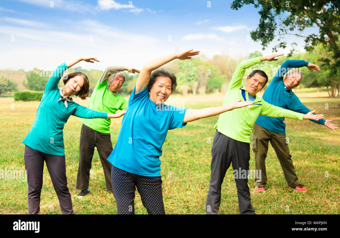 happy asian Senior Group Friends Exercise and   having fun Stock Photo