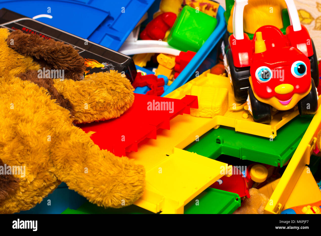 Colorful building blocks toys, toy dog, toy machine Stock Photo