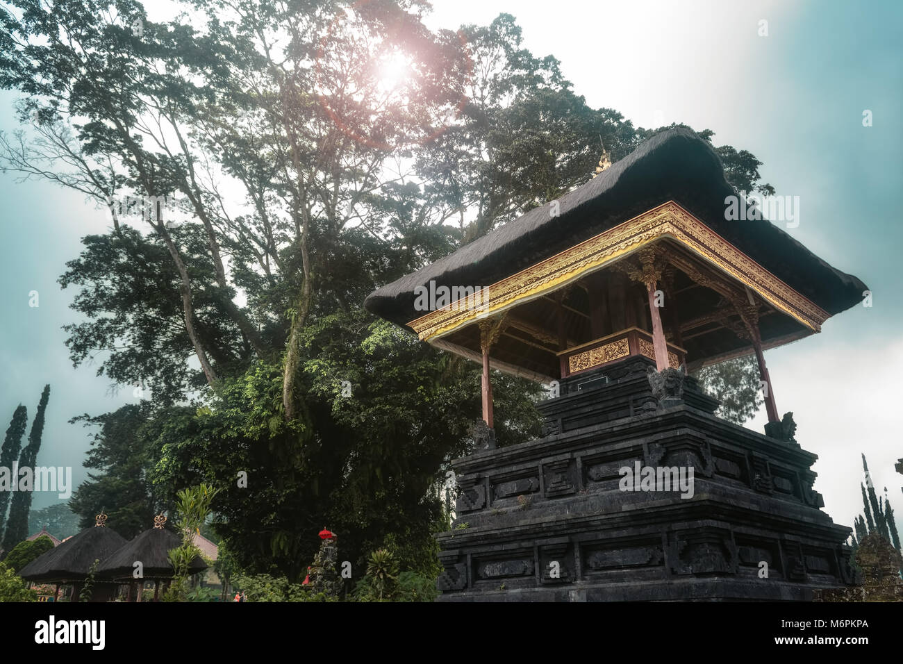 Bali Temple amid green lush tree and tropical forest Stock Photo