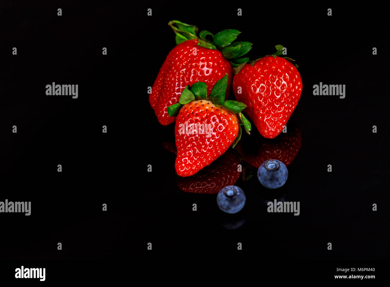 Collage group of berries and strawberries, blueberries, raspberries ...