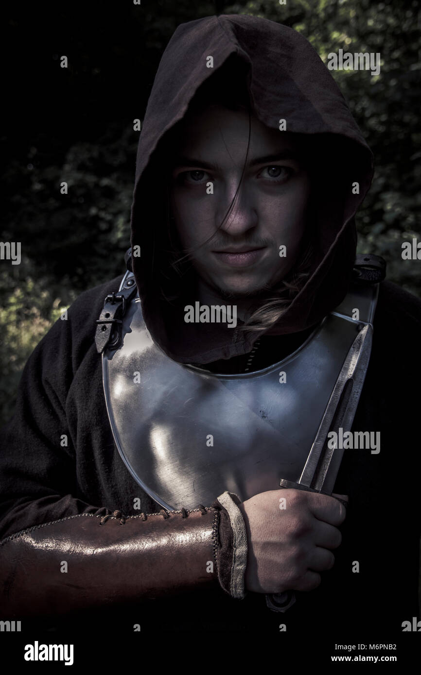 Hooded soldier with knife Stock Photo