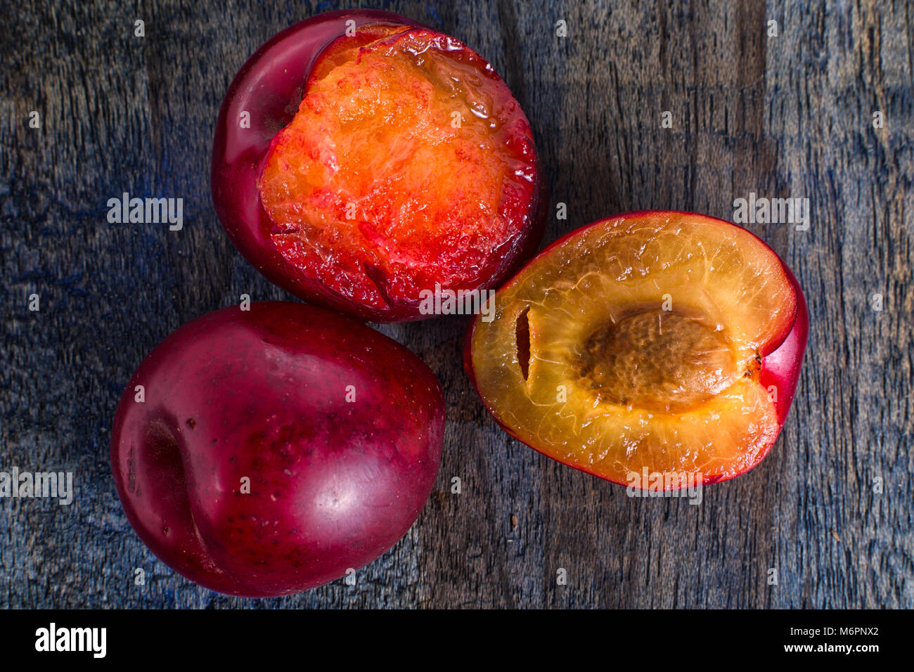 small red plums in Ecuador called claudia Stock Photo