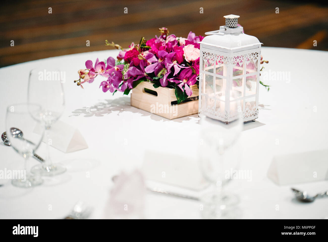 The Wedding Reception Dinner Table Setup Decorated With The Candle
