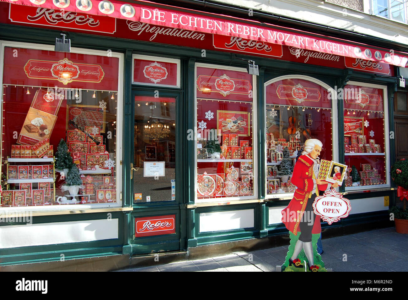 Shop selling Mozart Kugeln in the city of Salzburg Austria Stock Photo
