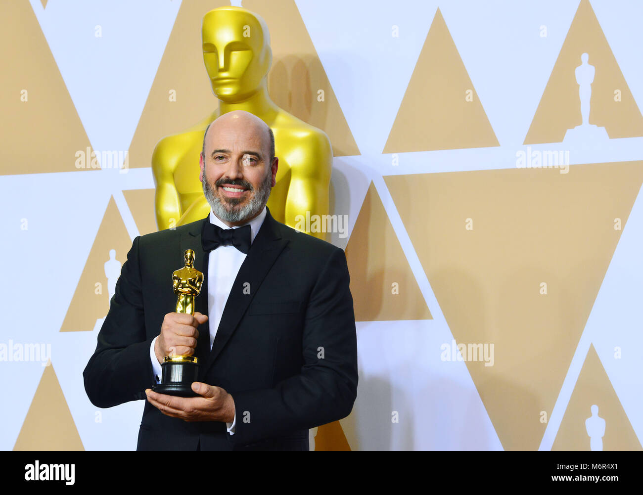 Costume designer Mark Bridges, winner of the Best Costume Design award