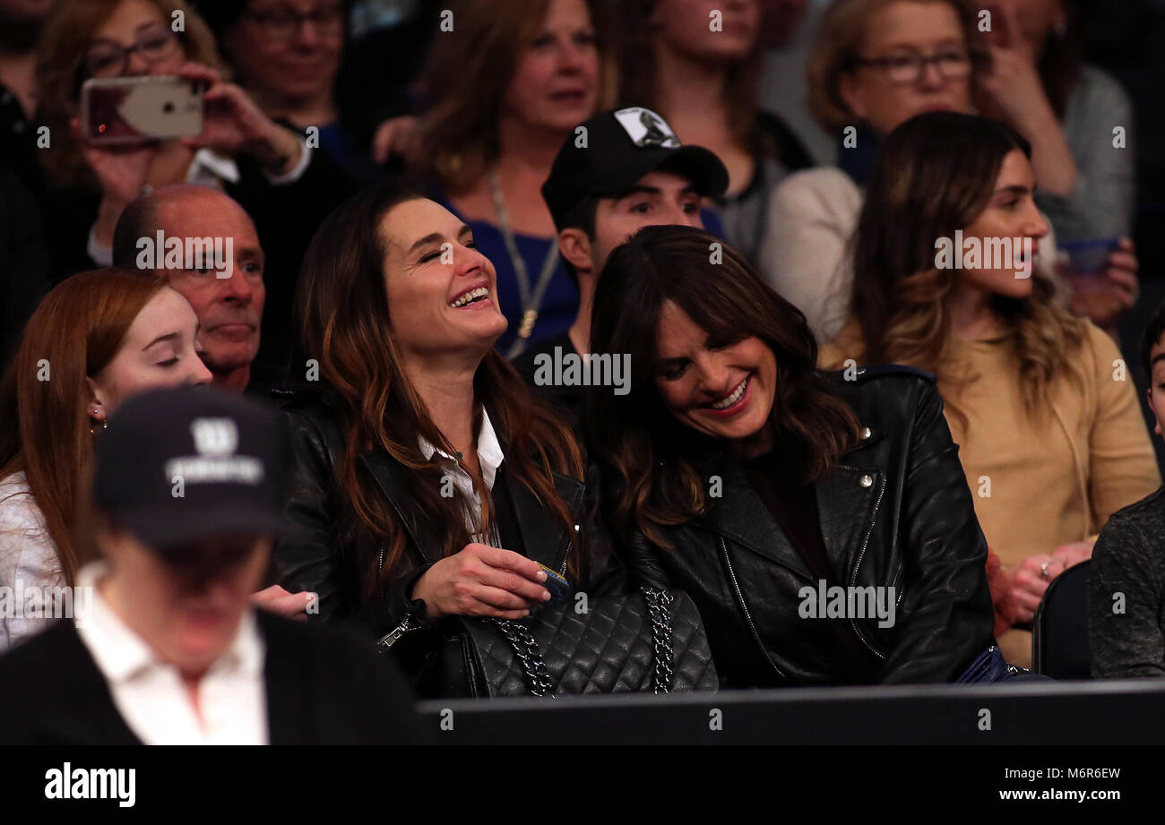 New York, USA. 5th March, 2018. Brooke Shields and Mariska Hargitay share a laugh at court side during the Tie Break Tens tennis tournament at Madison Square Garden in New York. The tournament features eight of the tours top female players competing for a $250,000 winners prize. Credit: Adam Stoltman/Alamy Live News Stock Photo