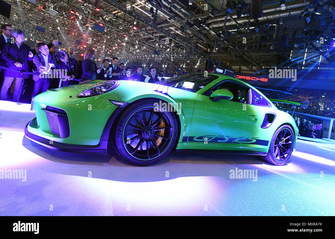 Geneva, Switzerland. 06th Mar, 2018. The Porsche 911 GT3 RS being presented during the first press day of the Geneva Motor Show in Geneva, Switzerland, 06 March 2018. The 88th Geneva Motor Show starts on 08 March and ends on 18 March. About 180 exhibitors will be displaying 900 models and the organisers expect 700,000 visitors. Credit: dpa picture alliance/Alamy Live News Stock Photo
