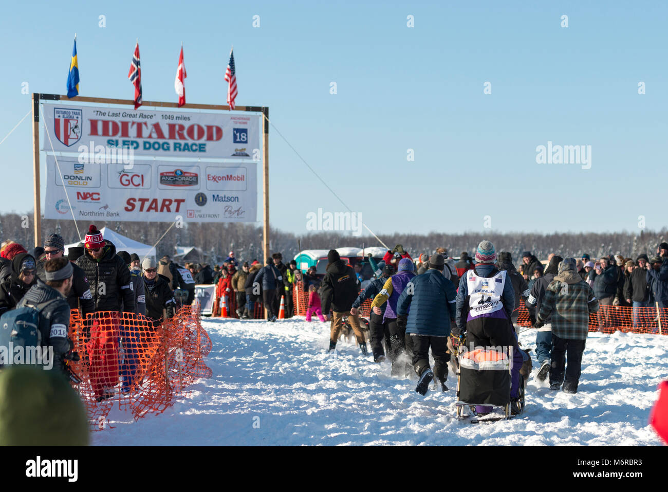 Willow, Alaska, USA. 4th Mar, 2018. Tara Cicatello of Buffalo, NY, USA approaching the start line of the Iditarod Sled Dog Race. Credit: Kristen Bentz/Alamy Live News Stock Photo