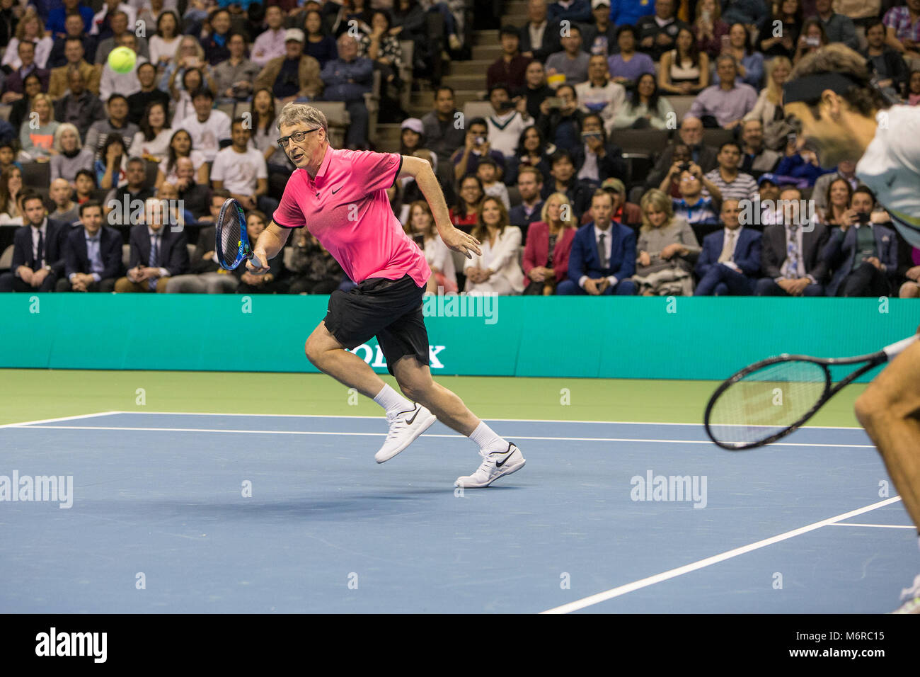 San Jose, California, USA. 05th Mar, 2018. Bill Gates runs down a ball during his doubles set with Roger Federer (SUI) against Jack Sock (USA) and Savannah Guthrie at The Match for Africa 5 Silicon Valley played at the SAP Center in San Jose, California. © Mal Taam/TennisClix/CSM/Alamy Live News Stock Photo