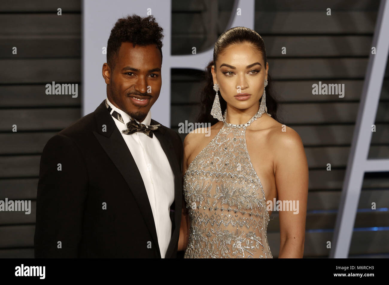 DJ Ruckus and Shanina Shaik attending the 2018 Vanity Fair Oscar Party