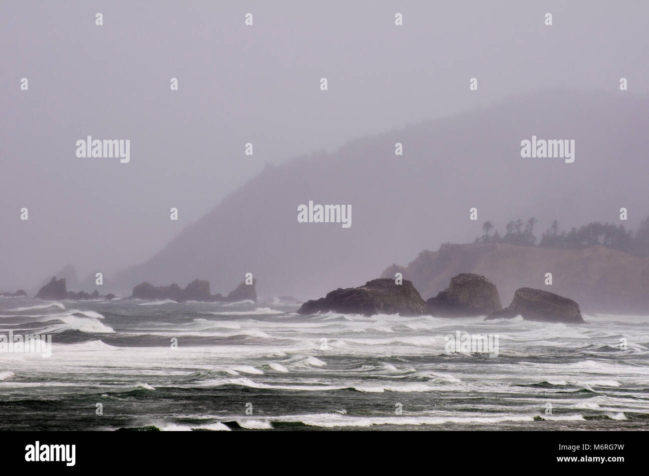 Cannon Beach, Oregon.  Seastacks in stormy weather on Oregon's coast. Stock Photo