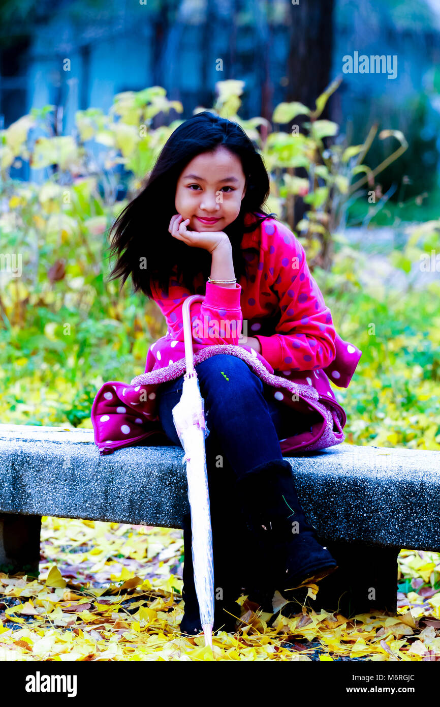 portrait of young beautiful girl with maple leaf Stock Photo - Alamy