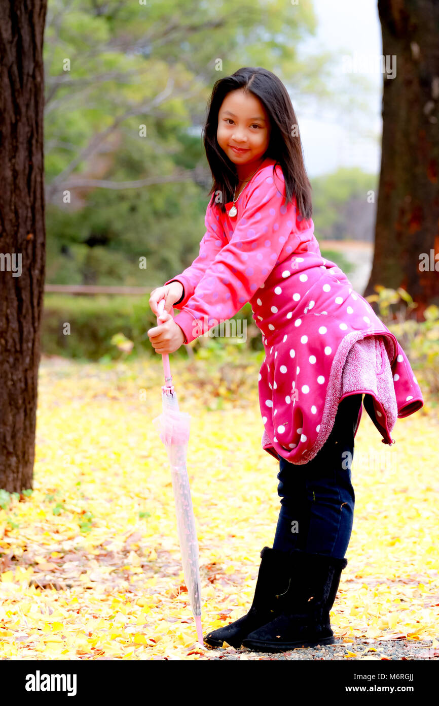 portrait of young beautiful girl with maple leaf Stock Photo - Alamy