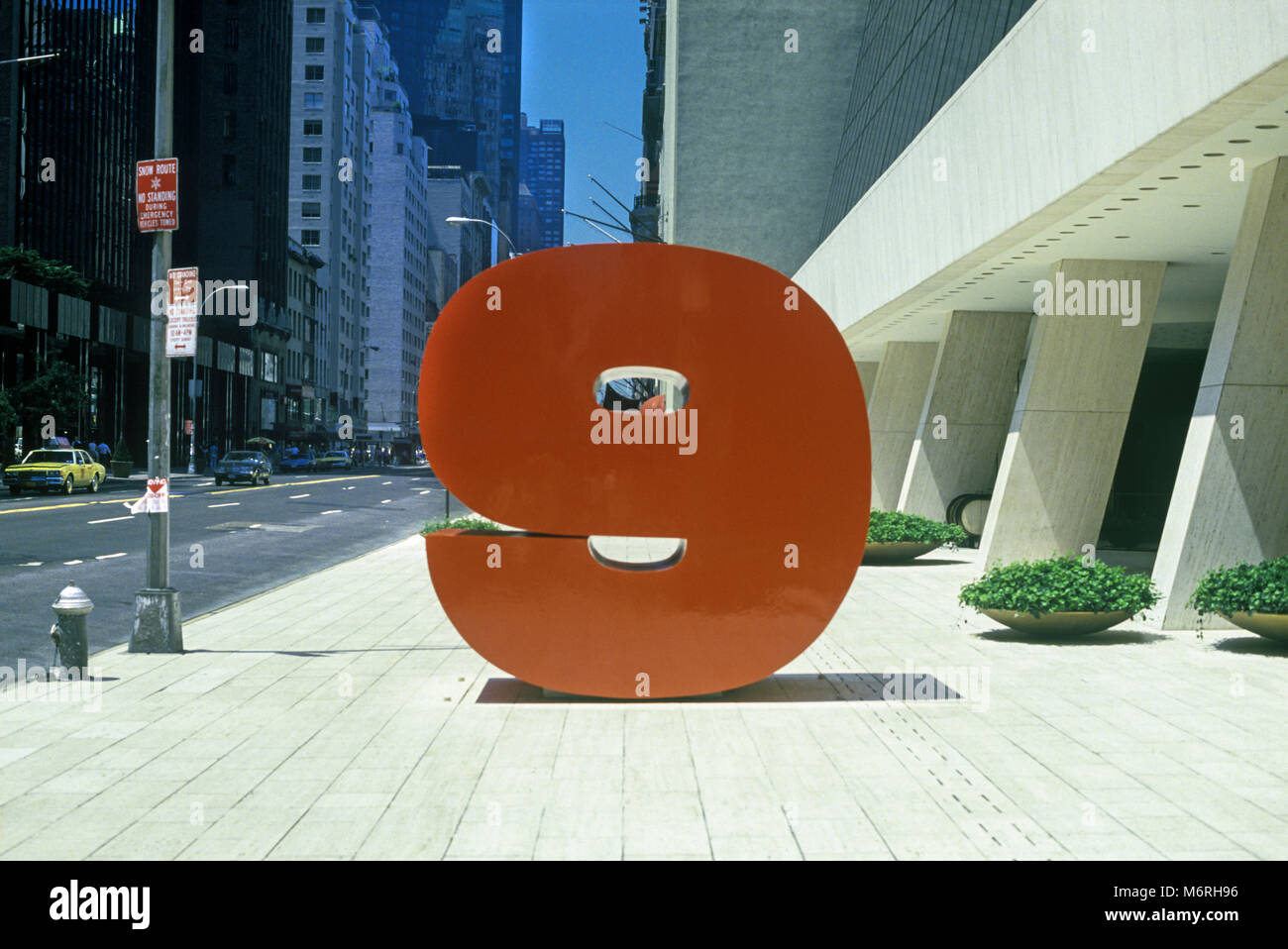 1987 HISTORICAL RED NUMBER NINE SCULPTURE (©IVAN CHERMAYEFF 1974) WEST