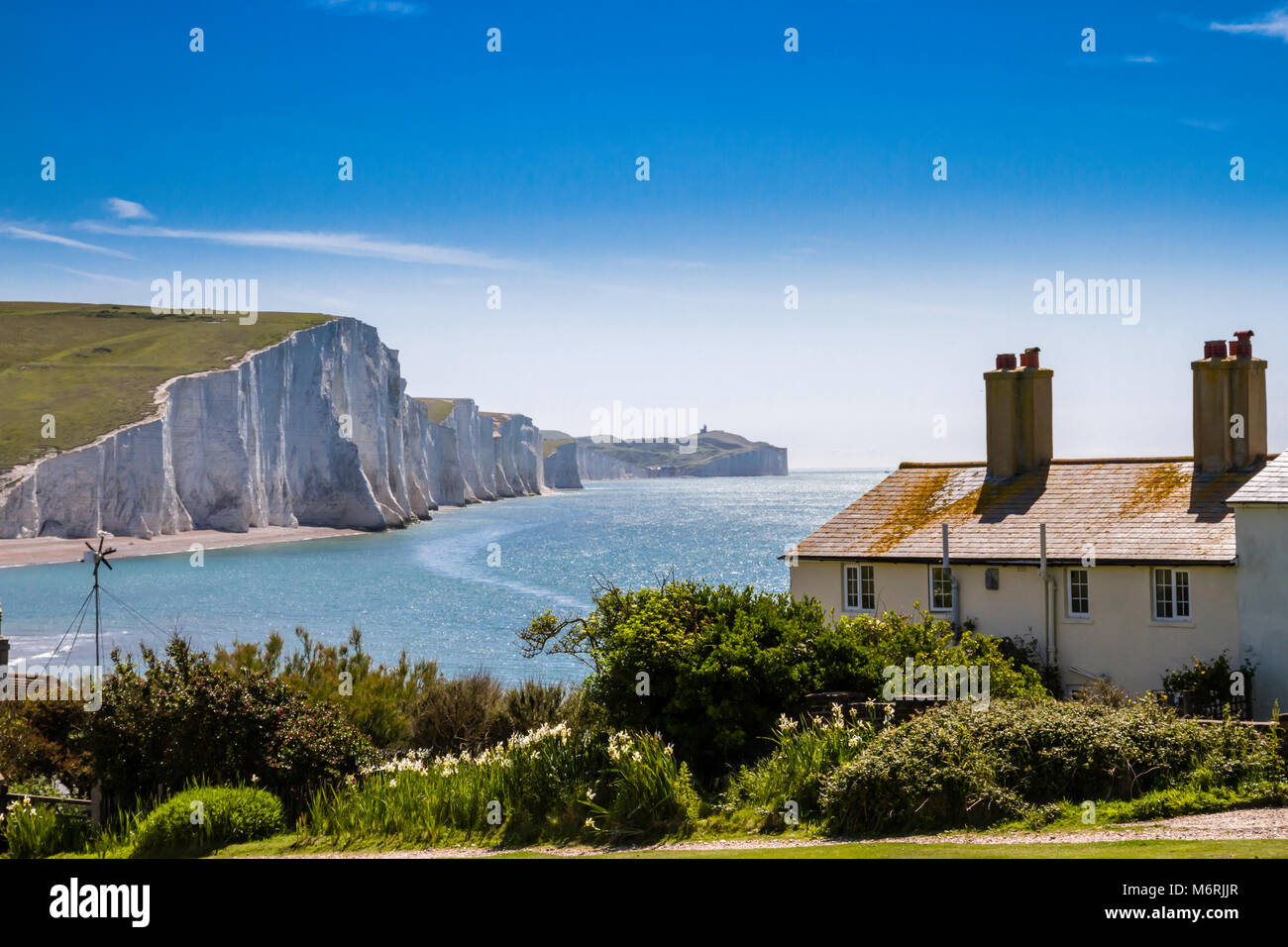 The Seven Sisters chalk cliffs and Coastguard Cottages. Stock Photo
