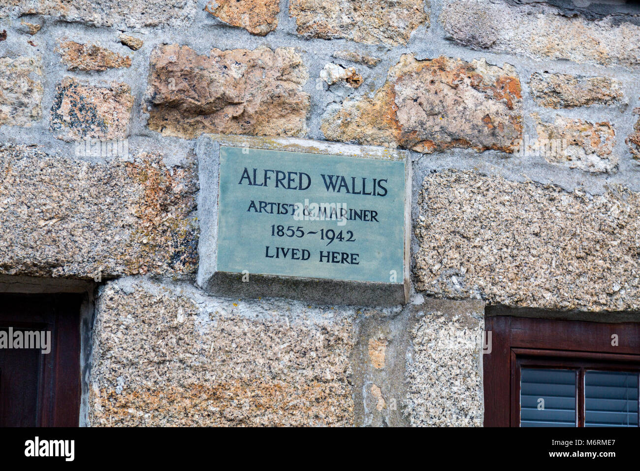 A small terraced house with plaque, the former home of Alfred Wallis