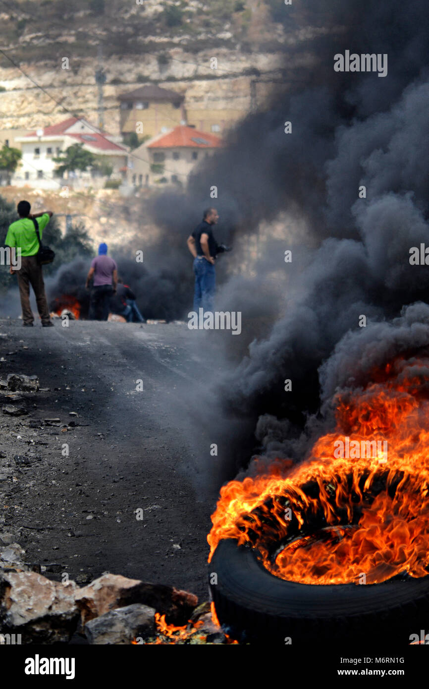 IsraeliPalestinian conflict burning tyres during protest