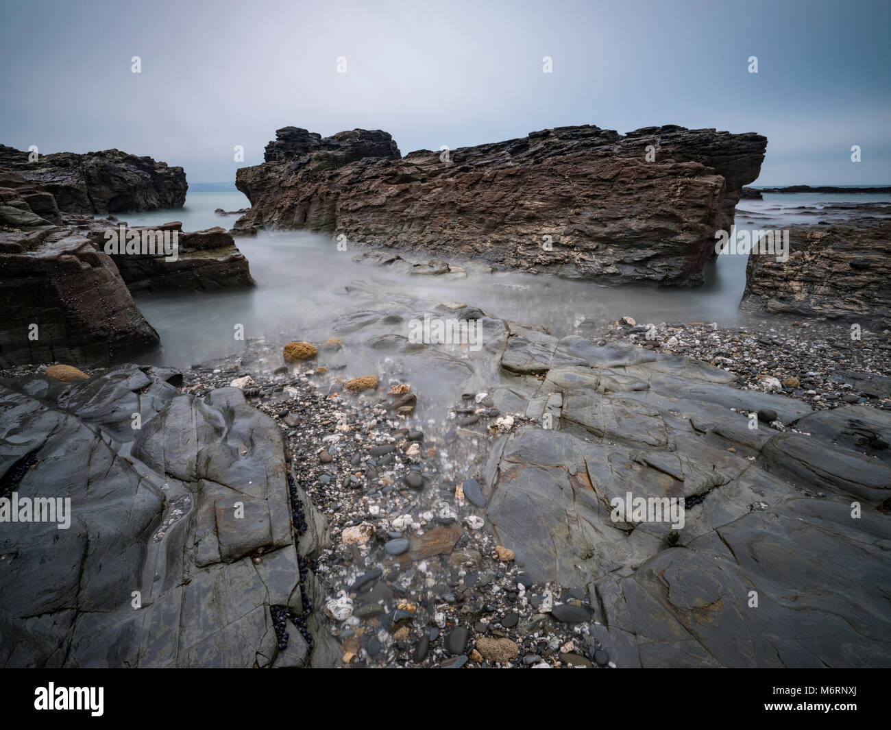 Godrevy beach rocks and Lighthouse Cornwall Stock Photo - Alamy